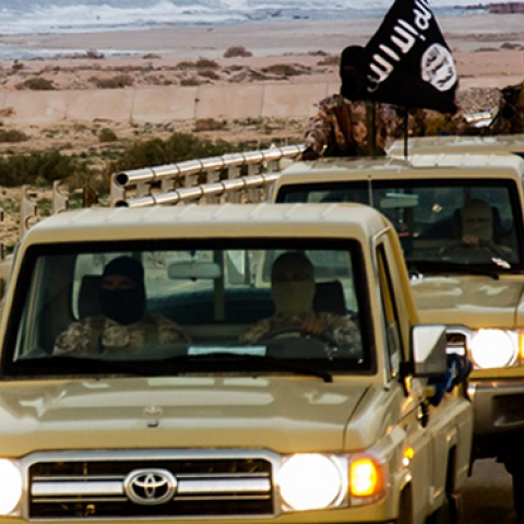 An image made available by propaganda Islamist media outlet Welayat Tarablos on February 18, allegedly shows members of the Islamic State militant group parading in a street in Libya's coastal city of Sirte.  (AGENCE FRANCE-PRESSE/GETTY IMAGES)