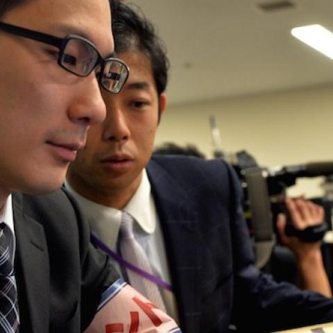 Government officers use their computers during a cyber security drill in Tokyo on March 18, 2014. (YOSHIKAZU TSUNO/AFP/Getty Images)