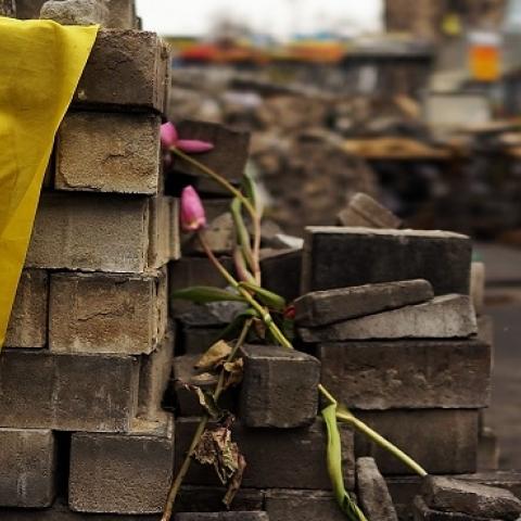 The Ukrainian flag on top of bricks used for barricades in Maidan Square, on March 19, 2014 in Kiev, Ukraine. (Spencer Platt/Getty Images)