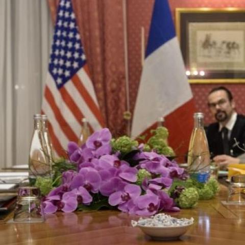 US Secretary of State John Kerry (L) and French Foreign Minister Laurent Fabius (R) talk before a meeting at the Beau Rivage Palace Hotel March 28, 2015 in Lausanne. (BRENDAN SMIALOWSKI/AFP/Getty Images)