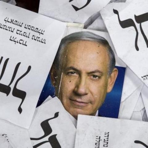 Copies of ballots papers and campaign posters for Israel's Prime Minister Benjamin Netanyahu's Likud Party on March 18, 2015 in Tel Aviv. (JACK GUEZ/AFP/Getty Images)