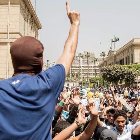 A group of Egyptians stage demonstration against Egypt's el-Sisi government at Cairo University in Giza, Egypt on April 19, 2015. (Stringer/Anadolu Agency/Getty Images)
