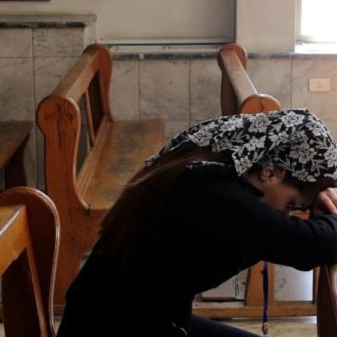 Displaced Assyrians at the Ibrahim-al Khalil Melkite Greek Catholic church in the Jaramana district on the outskirts of the capital Damascus on March 1, 2015. (LOUAI BESHARA/AFP/Getty Images)