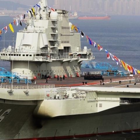 China's first aircraft carrier, a former Soviet carrier called the Varyag, docked after its handover to the People's Liberation Army (PLA) navy in Dalian, northeast China's Liaoning province, September 24, 2012. (STR/AFP/Getty Images)
