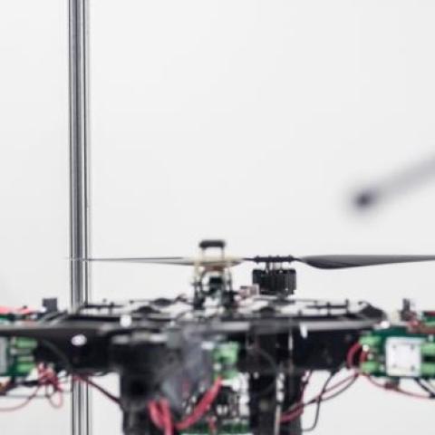 A man looks at drones on display at the International Drone Expo 2015 at Makuhari Messe on May 21, 2015 in Chiba, Japan. (Chris McGrath/Getty Images)