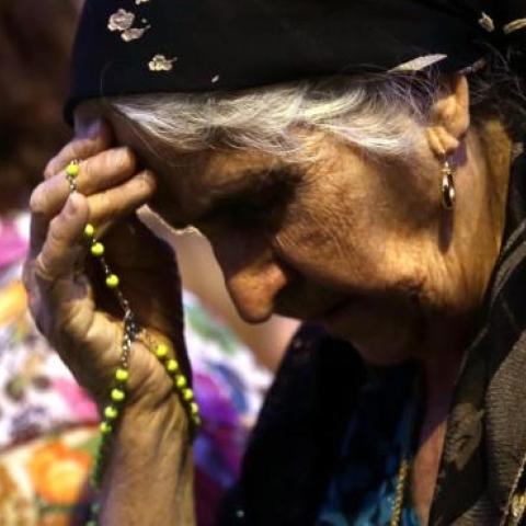 Iraqi Christians, who fled the violence in the northern Iraqi city of Mosul, attend a mass on May 31, 2015 in Arbil, Iraq. (SAFIN HAMED/AFP/Getty Images)