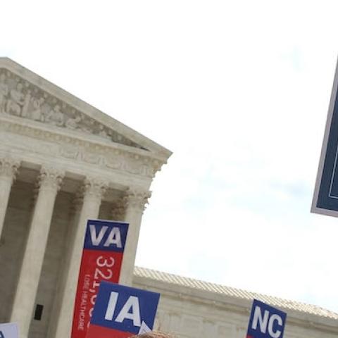 People celebrate in front of the US Supreme Court after ruling was announced on the Affordable Care Act. June 25, 2015 in Washington, DC. (Mark Wilson/Getty Images)
