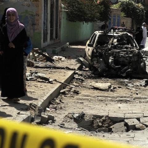 Yemenis at the site of a car bomb attack in the northern Al Jaraf neighbourhood of Sanaa, Yemen. (Mohammed Hamoud/Anadolu Agency/Getty Images)