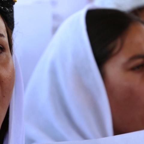 Iraqi Yazidis protest outside the United Nations office in Arbil, Iraq, on August 2, 2015 in support of women from their community who were kidnapped by ISIS. (SAFIN HAMED/AFP/Getty Images)