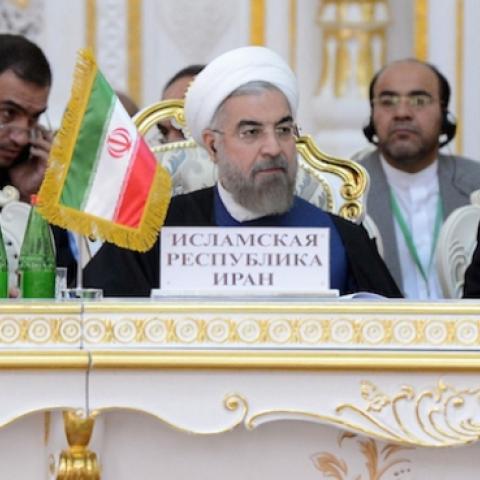 Iran President Hassan Rouhani (C) attends the Shanghai Cooperation Organization (SCO) Summit in Dushanbe, Tajikistan, September 12, 2014. (Kyrgyzstan Presidential Office Press Center/Pool/Dosaliev Sultan/Anadolu Agency/Getty Images)
