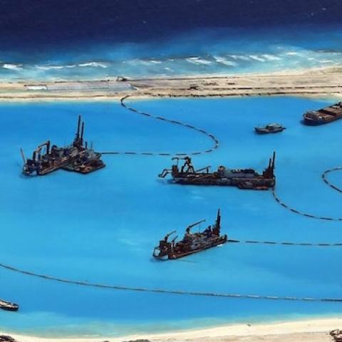 A handout picture by the Armed Forces of the Philippines (AFP) Public Affairs Office shows construction at Kagitingan (Fiery Cross) Reef in the disputed Spratley Islands in the south China Sea by China. Photo: EPA