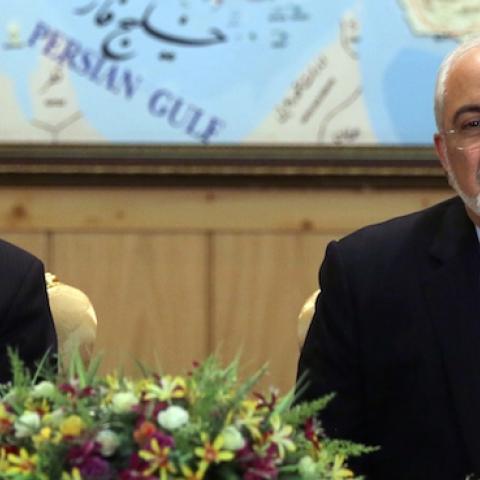 Iranian Foreign Minister Mohammad Javad Zarif (R) and the head of Iran's Atomic Energy Organization Ali Akbar Salehi (L), July 15, 2015, (ATTA KENARE/AFP/Getty Images)