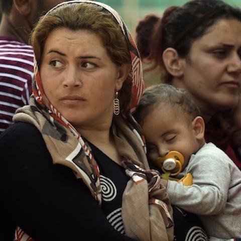 Syrian refugees at a registration camp in Presevo after their arrival in Serbia on August 30, 2015. (ARIS MESSINIS/AFP/Getty Images)