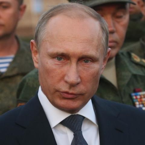 Russian President Vladimir Putin visits the Center-2015 Military Drills at Donguzsky Range in Orenburg, Russia, September 19, 2015. (Sasha Mordovets/Getty Images)