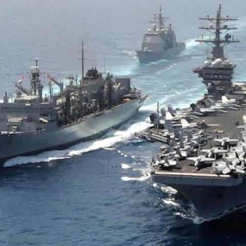 Germany's FGS Hamburg (F220), left, and the aircraft carrier USS Dwight D. Eisenhower (CVN 69), right, with the Military Sealift Command fast combat support ship USNS Bridge (T-AOE 10), center, in the Arabian Sea on March 23, 2013. (U.S. Navy/Released)
