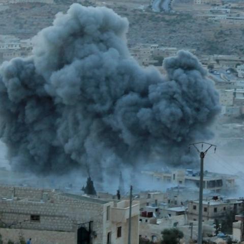 Russian warcrafts hit the Syrian opposition controlled town Daret Ezza in Aleppo, Syria on October 13, 2015. (Mamun Abu Omer/Anadolu Agency/Getty Images)