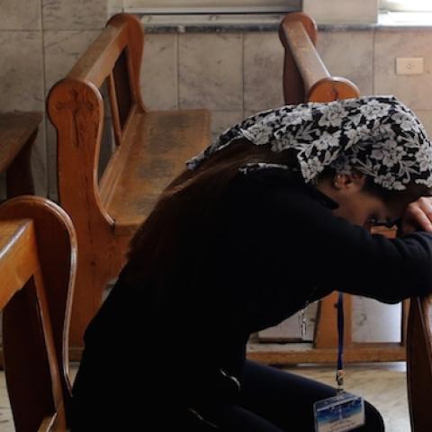 Displaced Assyrians take part in a prayer at the Ibrahim-al Khalil Melkite Greek Catholic church on the outskirts of the capital Damascus on March 1, 2015. (LOUAI BESHARA/AFP/Getty Images)