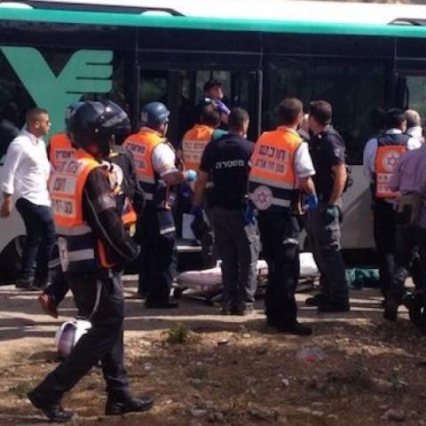 Police and emergency medical services treat the victims of a terror attack in the Armon Hanatziv neighborhood in Jerusalem on Oct. 13, 2015. (Israel Police)