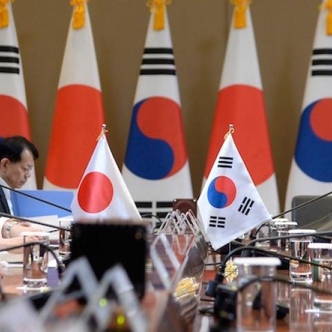 South Korean President Park Geun-Hye (R) talks with Japanese Prime Minister Shinzo Abe (L) during their meeting at the presidential Blue House on November 2, 2015 in Seoul, South Korea. (Song Kyung-Seok-Pool/Getty Images)