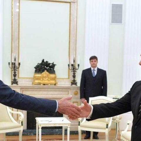 Syrian President Bashar al-Assad (L-2) meets with Russian President Vladimir Putin (R-2) at the Kremlin Palace in Moscow, Russia, on October 21, 2015. (Pool/Kremlin Press Office/Anadolu Agency/Getty Images)