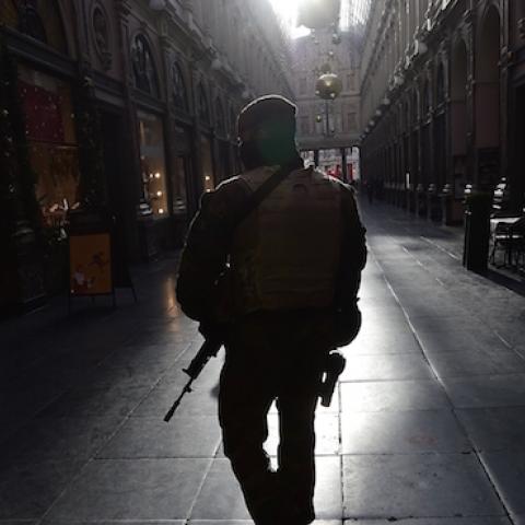 A soldier patrols in an empty shopping galery as the Belgian capital remains on the highest possible alert level, in Brussels on November 23, 2015. (EMMANUEL DUNAND/AFP/Getty Images)