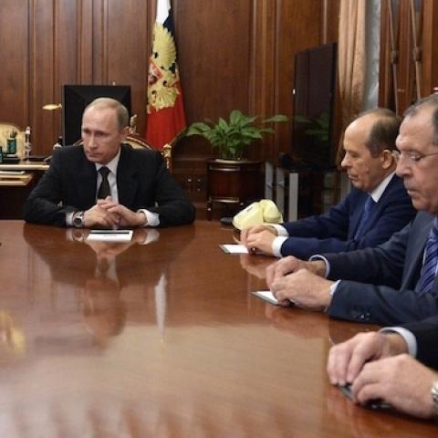 Russian President Vladimir Putin and high ranking Russian officials hold a meeting on the Russian plane that crashed in Egypt on Oct. 31, in Moscow, Russia on November 17, 2015. (Kremlin Press Office/Anadolu Agency/Getty Images)