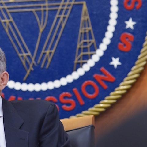 Federal Communications Commission Chairman Tom Wheeler listens to a speaker during a FCC hearing on the net neutrality on February 26, 2015 in Washington, DC. (MANDEL NGAN/AFP/Getty Images)