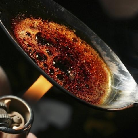 Burning heroin on a spoon. (Universal Images Group via Getty Images)