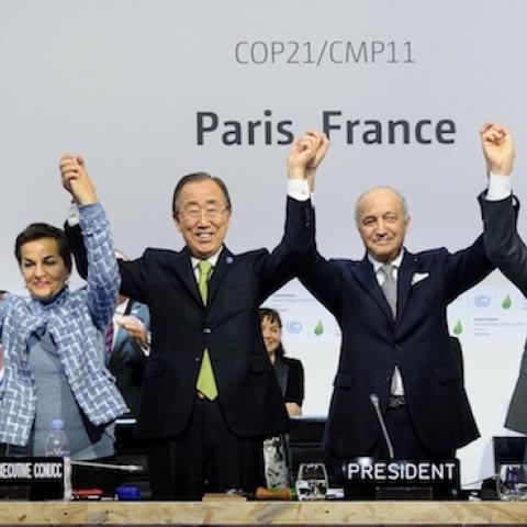 Climate change deal struck at the COP21 Climate Conference in Le Bourget, north of Paris, on December 12, 2015. (Arnaud BOUISSOU/COP21/Anadolu Agency/Getty Images)