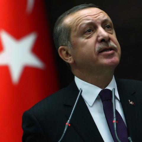 Turkey's Prime Minister Tayyip Erdogan addresses members of parliament during a meeting at the Turkish parliament in Ankara on February 26, 2013. (ADEM ALTAN/AFP/Getty Images)