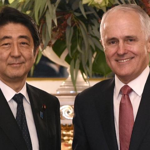 Australian Prime Minister Malcolm Turnbull (R) shakes hands with Japanese Prime Minister Shinzo Abe (L) before their meeting at the state guest house in Tokyo on December 18, 2015. (FRANCK ROBICHON/AFP/Getty Images)