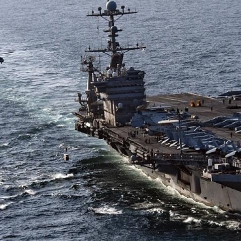 The aircraft carrier USS John C. Stennis (CVN 74) alongside the Military Sealift Command fast combat support ship USNS Rainier (T-AOE 7).  (DoD/Released)