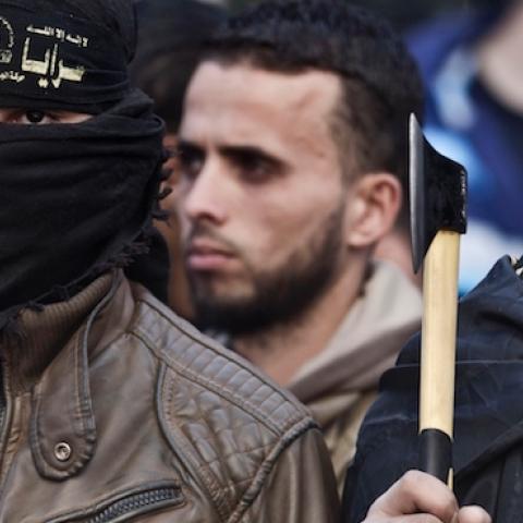 Palestinian Islamic Jihad militants take part in an anti-Israel rally in the town of Rafah in the southern Gaza Strip on December 18, 2015. (SAID KHATIB/AFP/Getty Images)