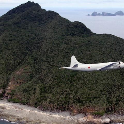 A P-3C patrol plane of Japanese Maritime Self-Defense Force flying over the Senkaku Islands/Diaoyu Islands in the East China Sea, October 13, 2011. (JAPAN POOL/AFP/Getty Images)