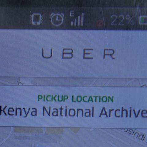 A non-licensed private cab driver working with Uber shows a Uber mobile application in Nairobi on February 4, 2016. (SIMON MAINA/AFP/Getty Images)