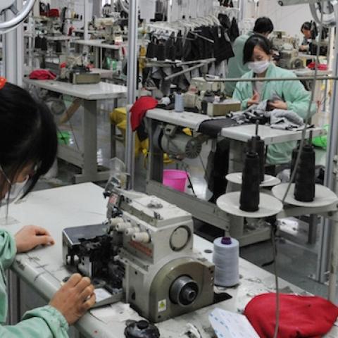 Workers sewing in a clothing factory in Bozhou, east China's Anhui province, November 16, 2013. (STR/AFP/Getty Images)