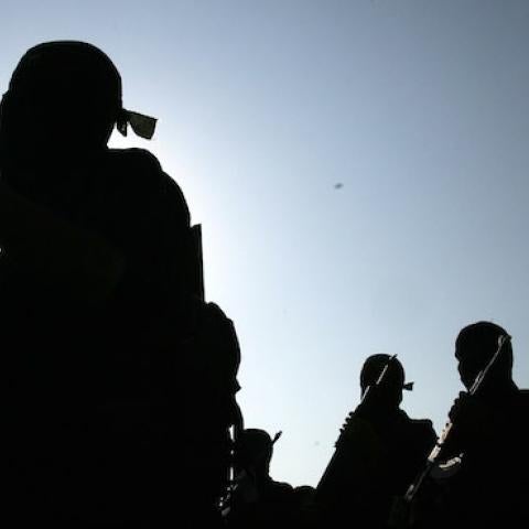 Masked Palestinian members of the Islamic Jihad military wing Saraya Al-Quds march in remembrance of its founder Fathi Shiqaqi on October 24, 2008 in Khan Younis, the Gaza Strip. (Abid Katib/Getty Images)