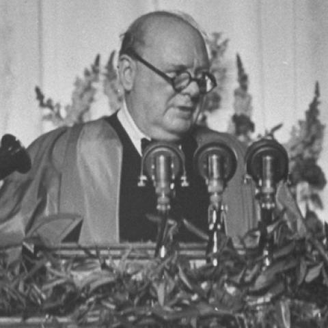 British Prime Minister Winston Churchill, wearing his academic robes and making a speech regarding the Communist threat, March 1946. (George Skadding/The LIFE Picture Collection/Getty Images)