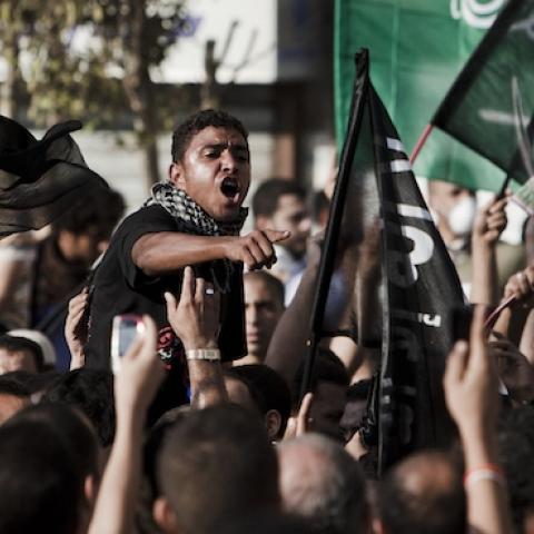 An Egyptian protester chants during a protest following midday prayers in Tahrir Square on September 14, 2012 in Cairo, Egypt. (Ed Giles/Getty Images)