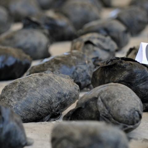 A shipment of cocaine seized in a large clandestine laboratory for the production of the drug, during its presentation to the press on March 16, 2013, at the military air base in Tumaco, Narino department, Colombia. (GUILLERMO LEGARIA/AFP/Getty Images)