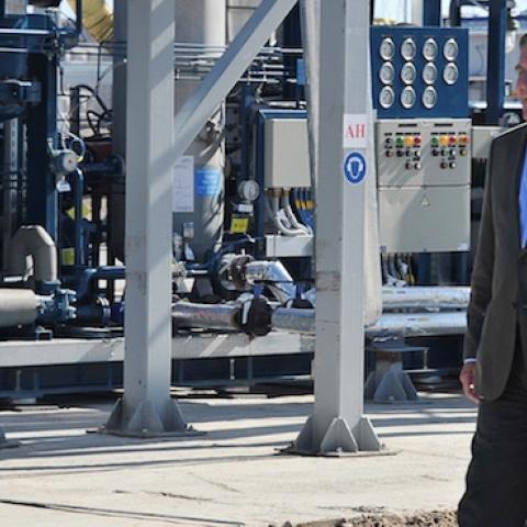 Then-Russian Prime Minister Vladimir Putin (C), Gazprom CEO Alexei Miller (R) and former German chancellor Gerhard Schroeder (L) at the gas compressor station 'Portovaya' outside Vyborg, September 6, 2011. (ALEXEY NIKOLSKY/AFP/Getty Images)