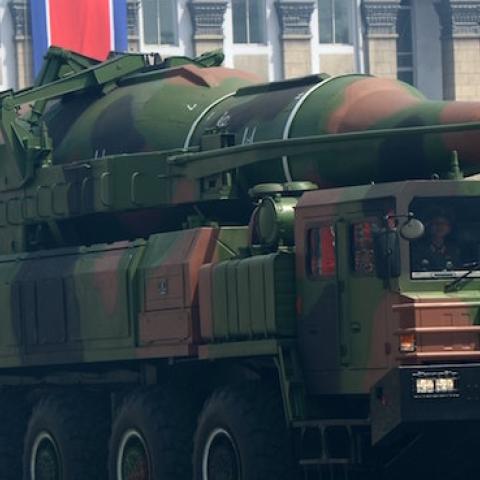 A launcher carrying what analysts have said is a mock-up of the KN-08 ICBM moves through Pyongyang on April 15, 2012, as part of a military parade. (Pedro Ugarte/AFP/Getty Images)