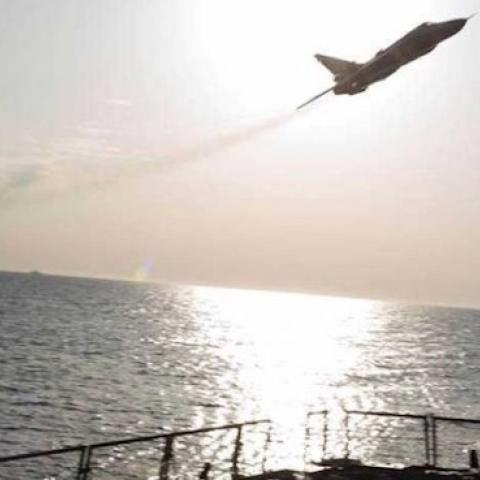 A Russian Sukhoi Su-24 attack aircraft makes a very low altitude pass by the guided missile destroyer USS Donald Cook in international waters in the Baltic Sea, April 12, 2016. (U.S. Navy/Released)