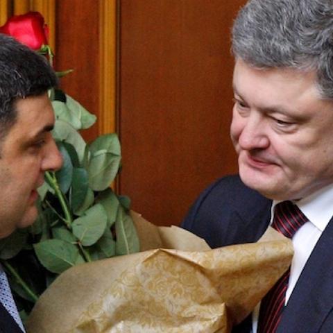 President of Ukraine, Petro Poroshenko (R) congratulations the newly elected Prime Minister Volodymyr Groysman (L) during a session of Ukrainian Parliament in Kiev, Ukraine on April 14, 2016. (Vladimir Shtanko/Anadolu Agency/Getty Images)