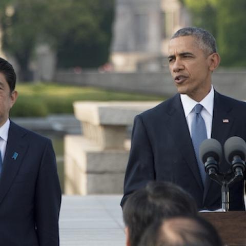 US President Barack Obama delivers remarks after laying a wreath at the Hiroshima Peace Memorial Park as Japan's Prime Minister Shinzo Abe (L) looks on, in Hiroshima on May 27, 2016. (JIM WATSON/AFP/Getty Images)