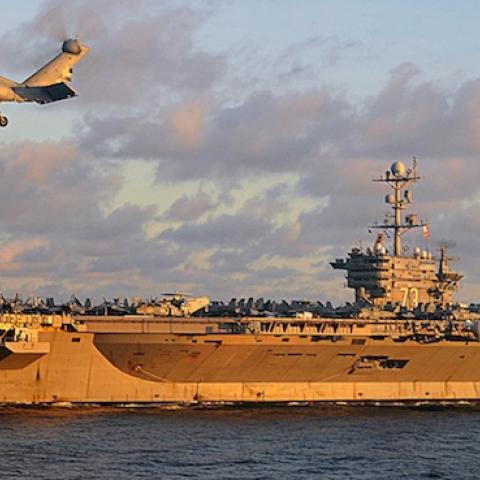 The Nimitz-class aircraft carrier USS George Washington (CVN 73) conducts a vertical replenishment at sea in the U.S. 7th Fleet area of responsibility, South China Sea, July 8, 2012. (U.S. Navy/Mass Communication Specialist Seaman Declan Barnes/Released)
