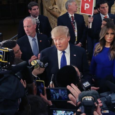Republican presidential candidate Donald Trump greets reporters at the Fox Theatre on March 3, 2016 in Detroit, Michigan. (Chip Somodevilla/Getty Images)
