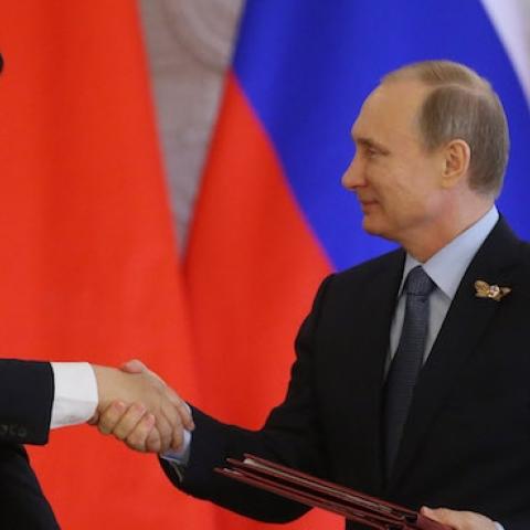 Russian President Vladimir Putin (R) shakes hands with Chinese President Xi Jinping (L) during their joint press conference in the Grand Kremlin Palace on May 8, 2015 in Moscow, Russia. (Sasha Mordovets/Getty Images)