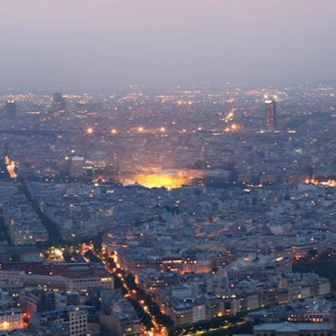 General view of Paris at dusk with the Eiffel Tower and the Hotel des Invalides prominent (Photo by Mike Hewitt/Getty Images)