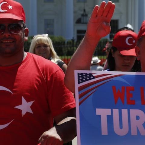 Supporters of Turkish President Recep Tayip Erdogan rally outside the White House in Washington, DC on July 17, 2016. (Photo: YURI GRIPAS/AFP/Getty Images)